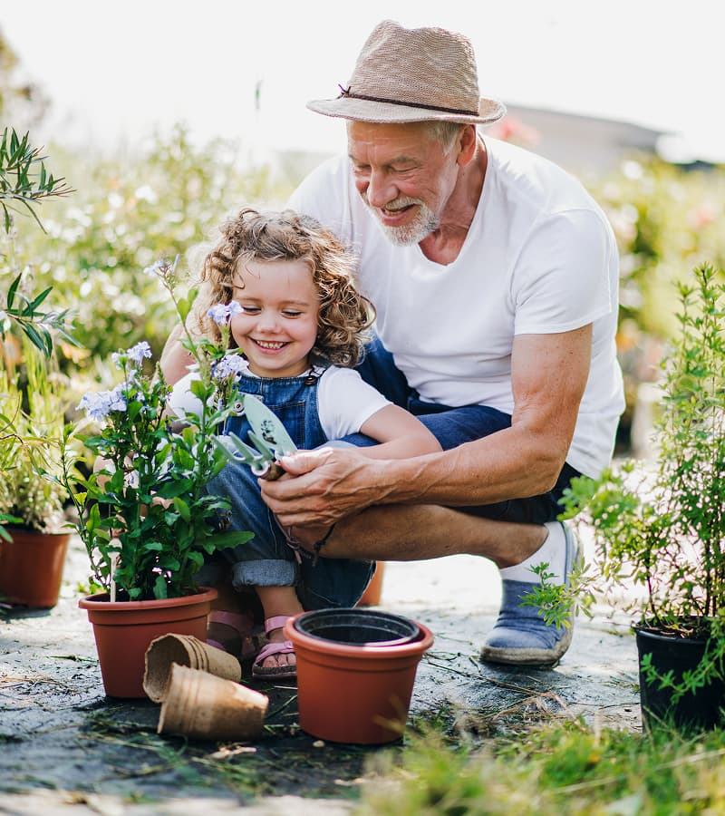 hnw-2 Girl gardening with her grandpa